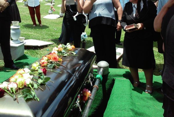 group of people attending burial
