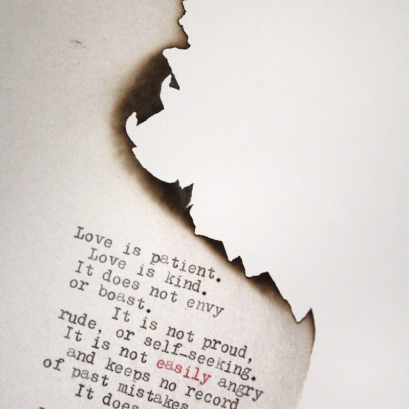 1 Corinthians 13 typed on burned paper