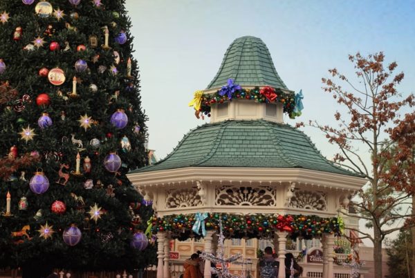 A French gazebo and Christmas tree decorated for the holidays.