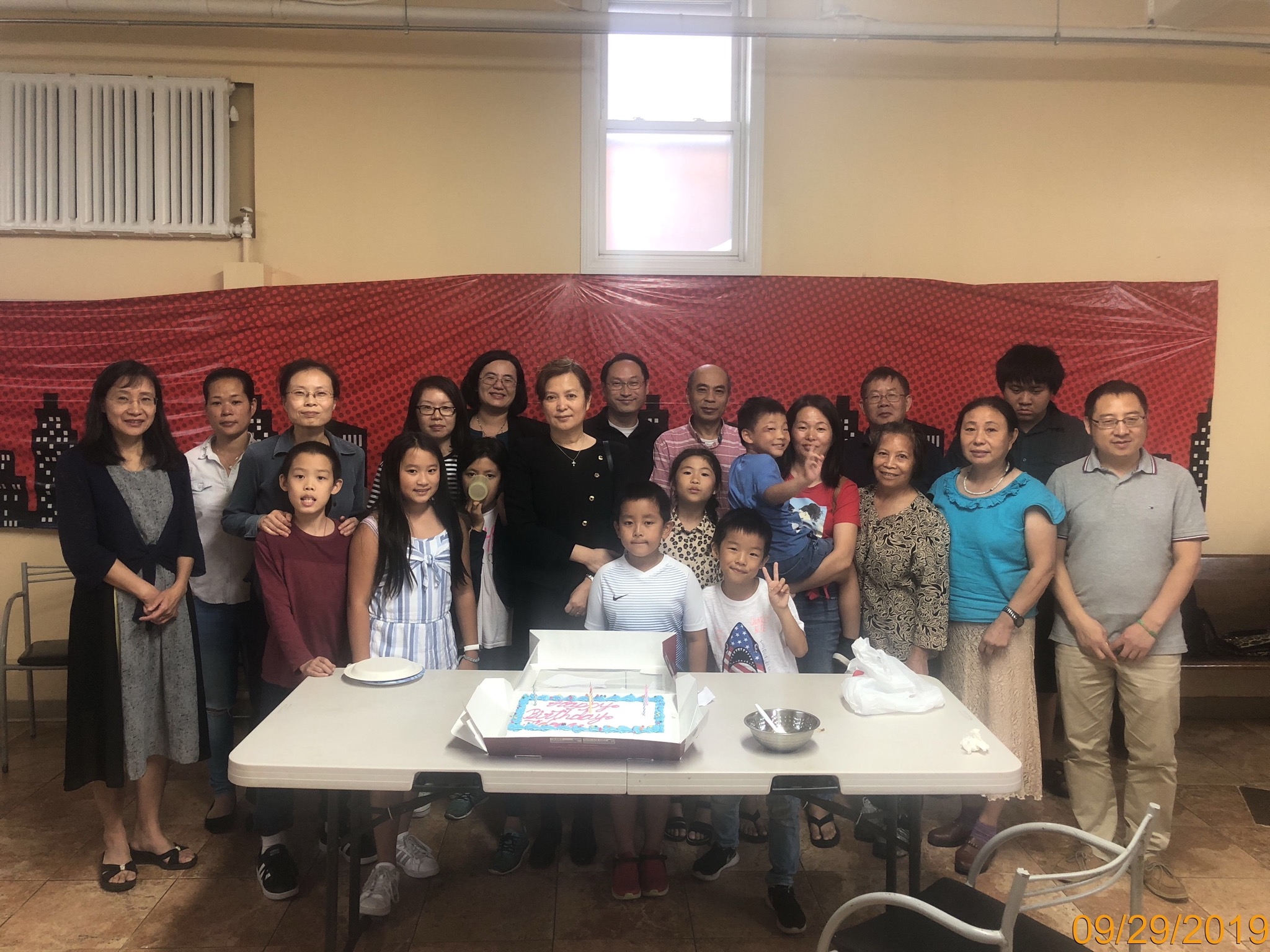 A Chinese church in the Bronx celebrates a birthday with cake.