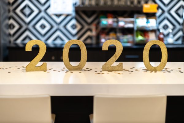 Golden 2020 numbers sit on a white countertop