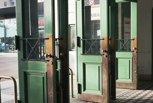 green and brown wooden door