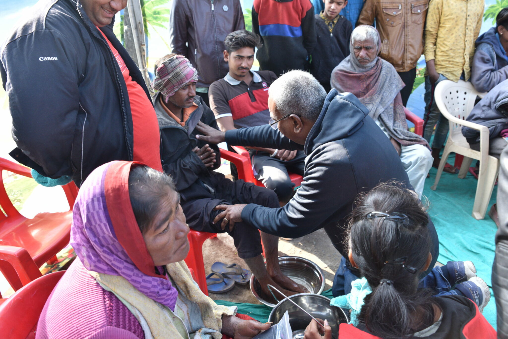 people in India get their feet washed on Christmas day