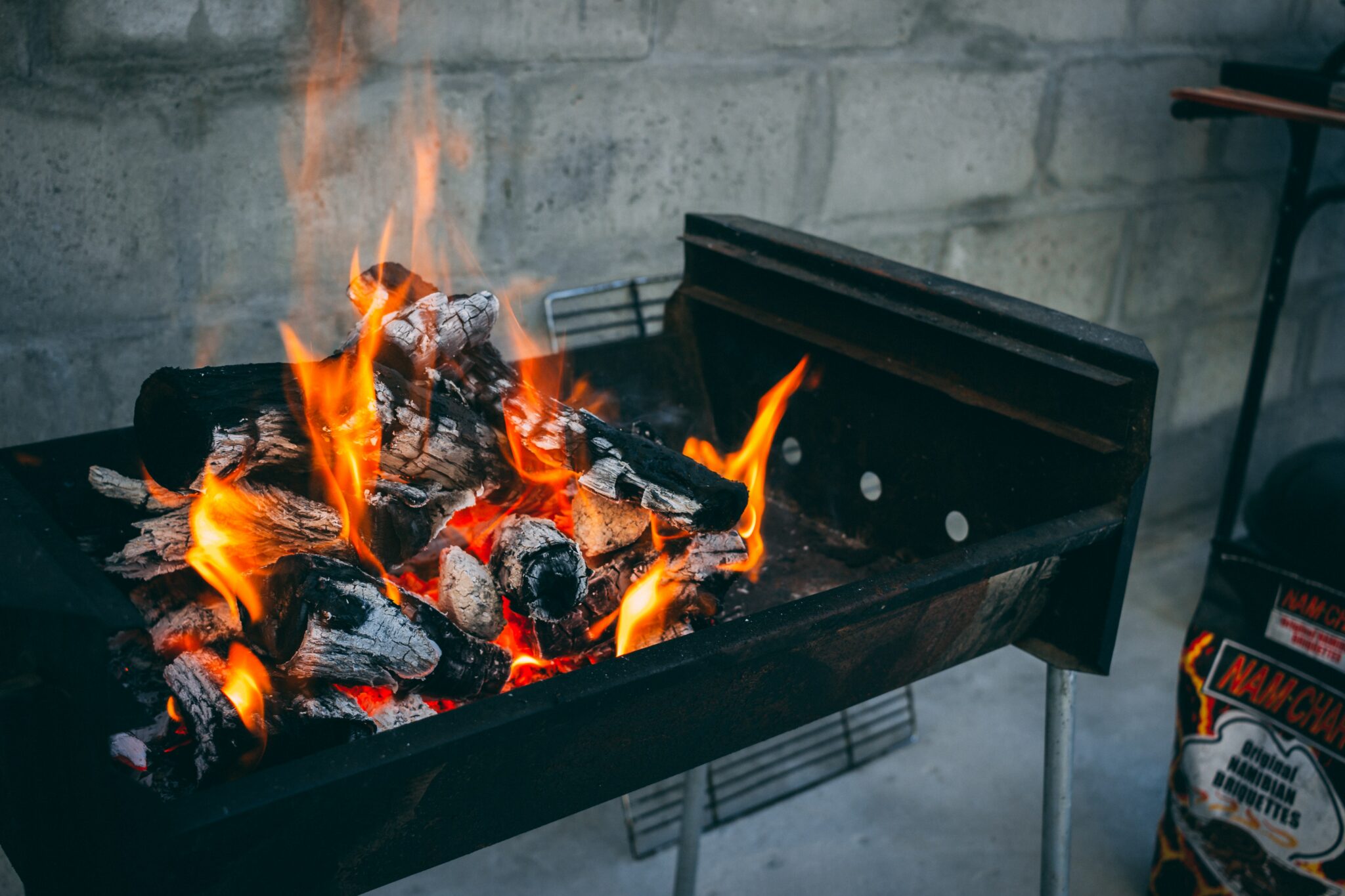 Christmas braai (barbecue) with charcoal and flame
